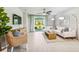 Open living area with a sectional sofa and access to a patio at 2051 Royal Tern Cir, Punta Gorda, FL 33983