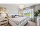 Spacious main bedroom with a large bed and neutral decor at 2051 Royal Tern Cir, Punta Gorda, FL 33983