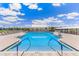 Inviting community pool with lounge chairs and a cabana at 2051 Royal Tern Cir, Punta Gorda, FL 33983