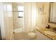 Updated bathroom with tub, toilet, and granite vanity at 25115 Esmeralda Ct, Punta Gorda, FL 33955