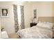 Guest bedroom with a full-size bed and neutral decor at 25115 Esmeralda Ct, Punta Gorda, FL 33955
