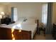 Main bedroom with a king-size bed and plenty of natural light at 25115 Esmeralda Ct, Punta Gorda, FL 33955