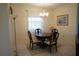 Bright dining room featuring a charming table set and chandelier at 25115 Esmeralda Ct, Punta Gorda, FL 33955