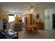 Kitchen with light wood cabinets, stainless steel appliances, and island at 25115 Esmeralda Ct, Punta Gorda, FL 33955