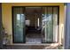 View from patio doors to the living room, showcasing seamless indoor-outdoor living at 25115 Esmeralda Ct, Punta Gorda, FL 33955