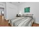 Charming bedroom with a comfortable bed and adjacent closet at 25228 Nocturne Ln, Punta Gorda, FL 33983