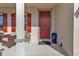 Home features a red front door and red shutters at 25228 Nocturne Ln, Punta Gorda, FL 33983