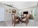 Elegant dining room with a large wood table and matching chairs at 27545 Monte Cristo Blvd, Punta Gorda, FL 33955