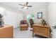 Home office with built-in desk, comfortable seating, and window at 27545 Monte Cristo Blvd, Punta Gorda, FL 33955