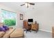 Bright home office features a spacious desk and seating area at 27545 Monte Cristo Blvd, Punta Gorda, FL 33955