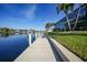 Private dock with walkway offering direct water access at 4025 Maltese Ct, Punta Gorda, FL 33950