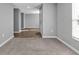 Open living room featuring hardwood flooring and neutral wall tones at 4210 Jody Ave, North Port, FL 34288