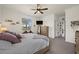 Spacious main bedroom with king-size bed and dresser at 43356 Waymark Pl, Punta Gorda, FL 33982