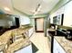 Galley style kitchen with granite countertops and stainless steel appliances at 54 Triangle St, Port Charlotte, FL 33954