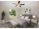 Serene bedroom with gray bedding and ample natural light at 7398 Petal Rd, North Port, FL 34291