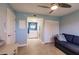 Multi-purpose room with sofa and built-in closet at 1345 Mediterranean Dr # A203, Punta Gorda, FL 33950