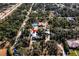 Aerial view of property showing house, pool, and surrounding land at 17221 Elder Ave, Port Charlotte, FL 33954