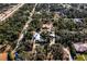 Aerial view showcasing home's location in a quiet, residential neighborhood at 17221 Elder Ave, Port Charlotte, FL 33954