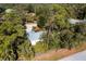Aerial view showing home's location on a wooded lot at 17221 Elder Ave, Port Charlotte, FL 33954