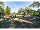 Relaxing backyard with firepit, seating, and landscaping at 17221 Elder Ave, Port Charlotte, FL 33954