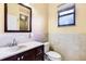 Clean bathroom with updated vanity, toilet, and shower at 17221 Elder Ave, Port Charlotte, FL 33954