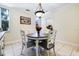 Cozy dining area with a round table and four chairs at 17221 Elder Ave, Port Charlotte, FL 33954