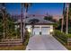 Two-car garage with metal roof and ample parking space at 17221 Elder Ave, Port Charlotte, FL 33954