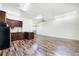 Kitchen with dark wood cabinets and wood flooring at 17221 Elder Ave, Port Charlotte, FL 33954