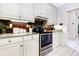 Updated kitchen, featuring granite countertops and stainless steel appliances at 17221 Elder Ave, Port Charlotte, FL 33954