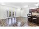 Open concept kitchen and living area with wood floors at 17221 Elder Ave, Port Charlotte, FL 33954