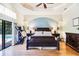 Spacious main bedroom with hardwood floors and pool view at 17221 Elder Ave, Port Charlotte, FL 33954