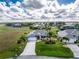 Aerial view of a single-Gathering home with a large yard and pool at 17260 Vagabond Cir, Punta Gorda, FL 33955