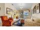 Cozy living room with pool views and comfortable seating at 17466 Fuego Ln, Punta Gorda, FL 33955