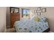 Cozy bedroom with a queen bed and dresser at 18835 Ashcroft Cir, Port Charlotte, FL 33948