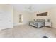 Spacious bedroom with tiled floors and a large window at 3307 Nevis Ct, Punta Gorda, FL 33950