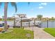 Private boat dock with walkway, providing convenient water access at 3948 La Costa Island Ct, Punta Gorda, FL 33950