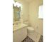 Clean bathroom with a toilet, sink, and shower at 4048 Oakview Dr # F2-4, Punta Gorda, FL 33980