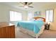 Bedroom with king bed and coastal decor at 4048 Oakview Dr # F2-4, Punta Gorda, FL 33980