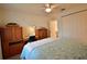 Bright bedroom with a double bed and built-in wooden wardrobe at 4048 Oakview Dr # F2-4, Punta Gorda, FL 33980