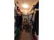 Large walk-in closet with shelving and rods at 4048 Oakview Dr # F2-4, Punta Gorda, FL 33980