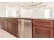 Kitchen island with stainless steel dishwasher at 425 Orinoco St, Punta Gorda, FL 33983