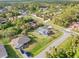 Aerial view showcasing the home, pool, and surrounding neighborhood at 4317 Eldron Ave, North Port, FL 34286