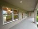 Covered patio with views into the home and backyard at 507 San Ambrosio St, Punta Gorda, FL 33983