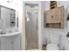 Clean bathroom with shower and updated vanity at 509 W Olympia Ave, Punta Gorda, FL 33950
