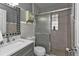 Modern bathroom with updated fixtures and a shower at 509 W Olympia Ave, Punta Gorda, FL 33950