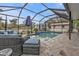 Relaxing screened pool and patio area at 509 W Olympia Ave, Punta Gorda, FL 33950