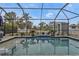 Relaxing screened pool and patio area, perfect for outdoor entertaining at 509 W Olympia Ave, Punta Gorda, FL 33950
