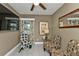 Relaxing sitting area with two armchairs and a TV at 509 W Olympia Ave, Punta Gorda, FL 33950