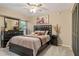 Bright bedroom with a queen-size bed and ample closet space at 1169 Guild St, Port Charlotte, FL 33952