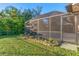 Large screened patio area perfect for outdoor entertaining at 1169 Guild St, Port Charlotte, FL 33952